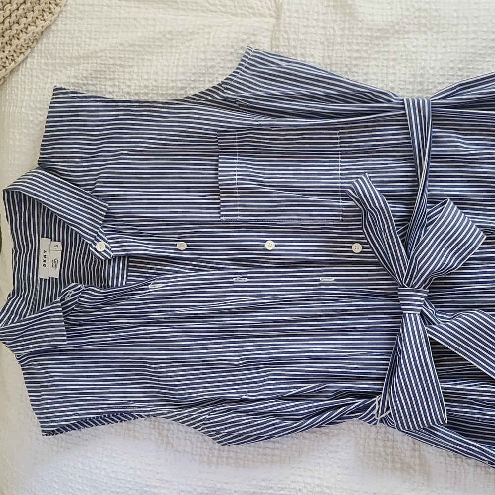 Long sleeveless blue dress with white stripes